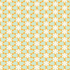 Fototapeta premium Retro orange daisy seamless floral pattern featuring orange and cream daisy motifs on a soft mint green background.Perefct for textile print,fabric for clothing,home decor,wallpaper,gift wrap,or web.