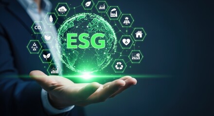 Environmental Social Governance Concept: Businessman Holding a Digital Globe with ESG Icons representing sustainability and corporate responsibility