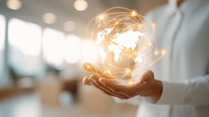 Global network concept: Woman holding a luminous world map with connected glowing lines