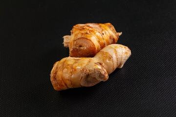 Raw galangal roots heap seasoning