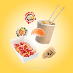 Asian food falling on pale orange background