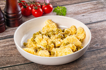 Scrambled egg omelet with green peas