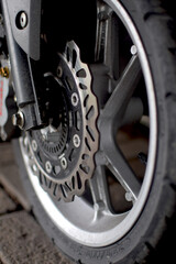 Front wheel of automatic motorbike stock photo