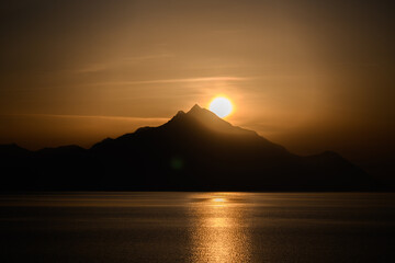 Sunrise over Mount Athos viewed from Sarti, Greece