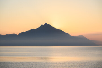 Sunrise over Mount Athos viewed from Sarti, Greece