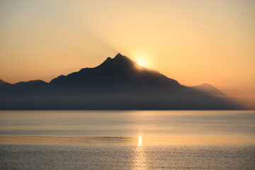 Sunrise over Mount Athos viewed from Sarti, Greece