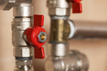 Domestic Water Shut-Off Valves. detailed view of the copper piping and two types of water shut-off valves