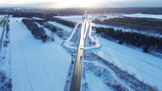 Countryside winter road with snow-covered fields - Powered by Adobe
