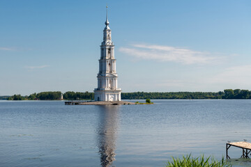 The flooded bell tower of St. Nicholas Cathedral rises above the surface of the Volga River. Kalyazin, Tver region.