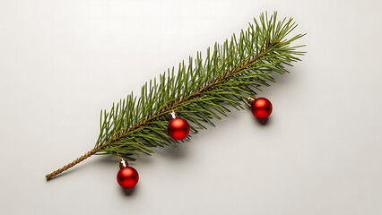 Modern minimalistic pine branch with three small red baubles on white