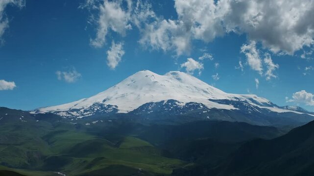 Beautiful view of Mount Elbrus and clouds, North Caucasus mountains, Russia, timelapse 4k