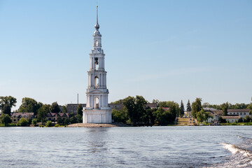 The flooded bell tower of St. Nicholas Cathedral rises above the surface of the Volga River. Kalyazin, Tver region.