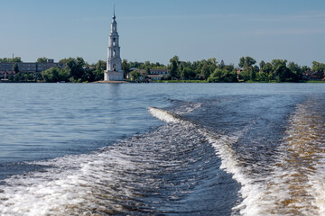 The flooded bell tower of St. Nicholas Cathedral rises above the surface of the Volga River. Kalyazin, Tver region.