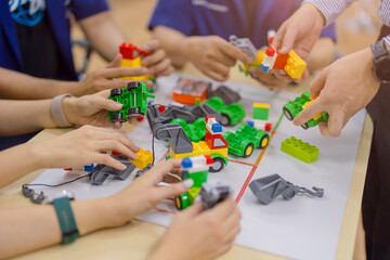Safety engineer student using toy situation simulation learning safety procedure in industry factory