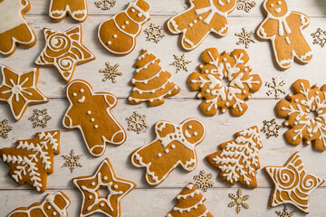 Holiday abstract background. Christmas gingerbread cookies, festive food, home baking. Flat lay