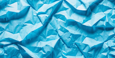 Background made of crumpled and torn blue paper