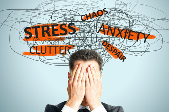 Facepalming stressed businessman with chaotic scribbles and anxiety words over light background representing mental overload and despair.