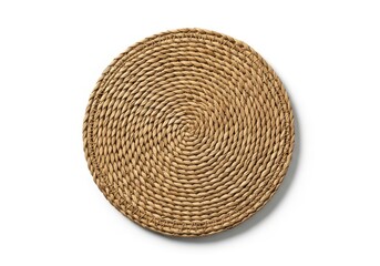 Round woven natural fiber placemat exhibits a detailed spiral construction on a clean white background.