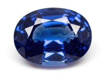 Oval cut deep blue gemstone displays brilliance and sharp facets against a white background