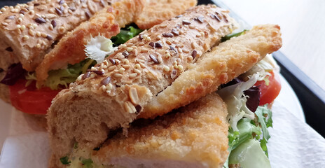 Seeded bread with chicken and vegetables. Healthy food.