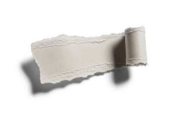 Obraz premium Horizontal strip of beige material features ragged edges and one end curled into a tight cylinder
