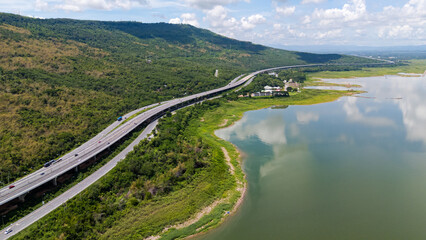 Drone shot The M6 motorway Nakhon Ratchasima Province - Bang Pa-in Lam Ta Khong River and Mountain. Motorway Korat Thailand
