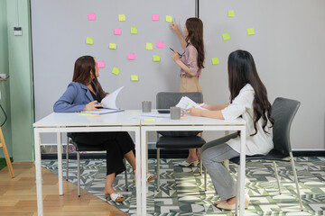 Women meet office consult job recruit, human resource ideas, business employees collaborate, brainstorming project ideas with sticky notes, team reviews documents, planning successful