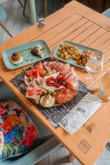 Elegant Italian aperitif with prosecco and warm gourmet dishes