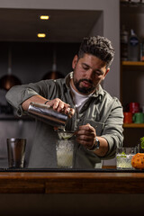 Professional bartender preparing a drink