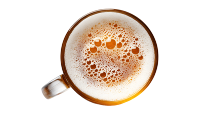 Overhead view of a freshly poured glass of golden beer with thick white foam and rising bubbles against black