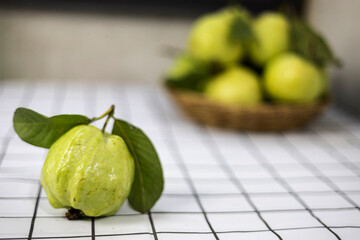 Green Guava In The Bamboo Basket On The Table