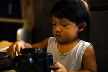 Toddler Exploring Photography Camera