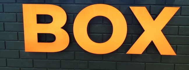 Number nine painted on the wall of a building