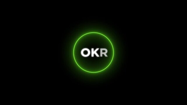 OKR acronym in white and silver letters inside a glowing circle on a black background objectives and key results