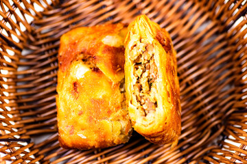 Chinese traditional snack meat patties placed in bamboo baskets