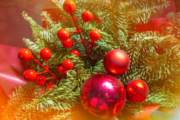 Christmas decorations, red balls, green tree branches, New Year's atmosphere