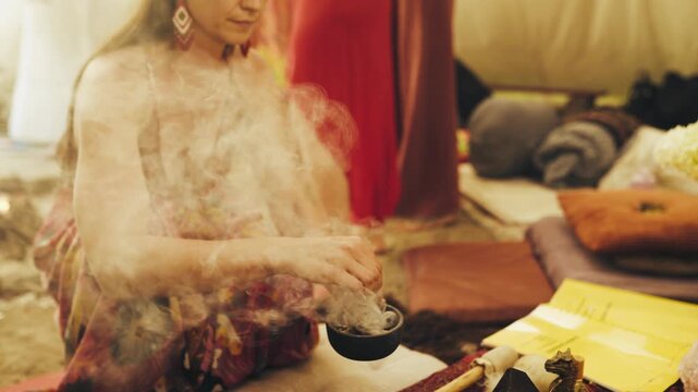 Spiritual healing ceremony, Mystical gathering with aromatic incense, Cleansing ritual held in tipi.