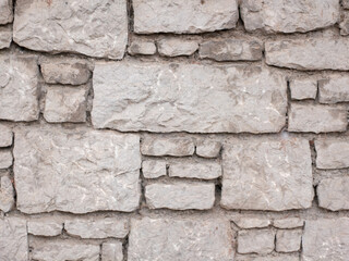 Rustic gray stone wall texture for background or design