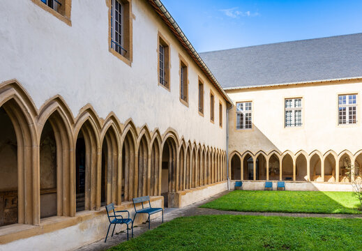 Metz, France - Sep. 5, 2025: Garden of the Recollets cloister, a former medieval convent in the Old Town district which houses the European Institute of Ecology and the municipal archives.