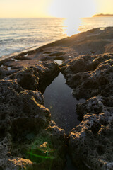 Sunset on Cane Malu beach in Sardinia.