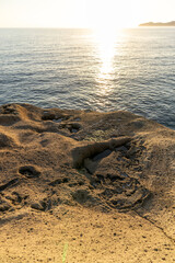 Sunset on Cane Malu beach in Sardinia.