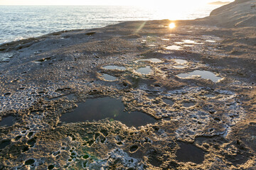 Sunset on Cane Malu beach in Sardinia.
