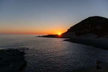 Sunset on Cane Malu beach in Sardinia.