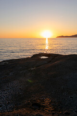 Sunset on Cane Malu beach in Sardinia.