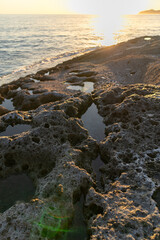 Sunset on Cane Malu beach in Sardinia.