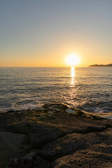 Sunset on Cane Malu beach in Sardinia.