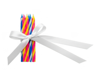 A colorful bundle of birthday candles tied with a white satin ribbon, isolated on transparent background