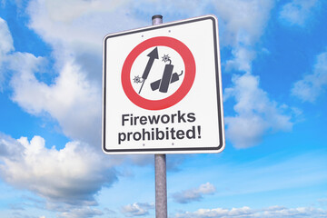3d rendering of a traffic sign prohibiting fireworks and firecrackers, with a blue cloudy sky in the background.