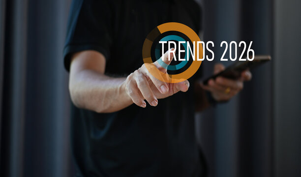 Businessman Pointing at Trends 2026 &mdash; Future Business and Technology Trend Concept