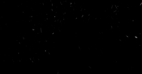 Falling snowflakes isolated on black background. Winter snow overlay texture for VFX, compositing, motion graphics and atmospheric effects